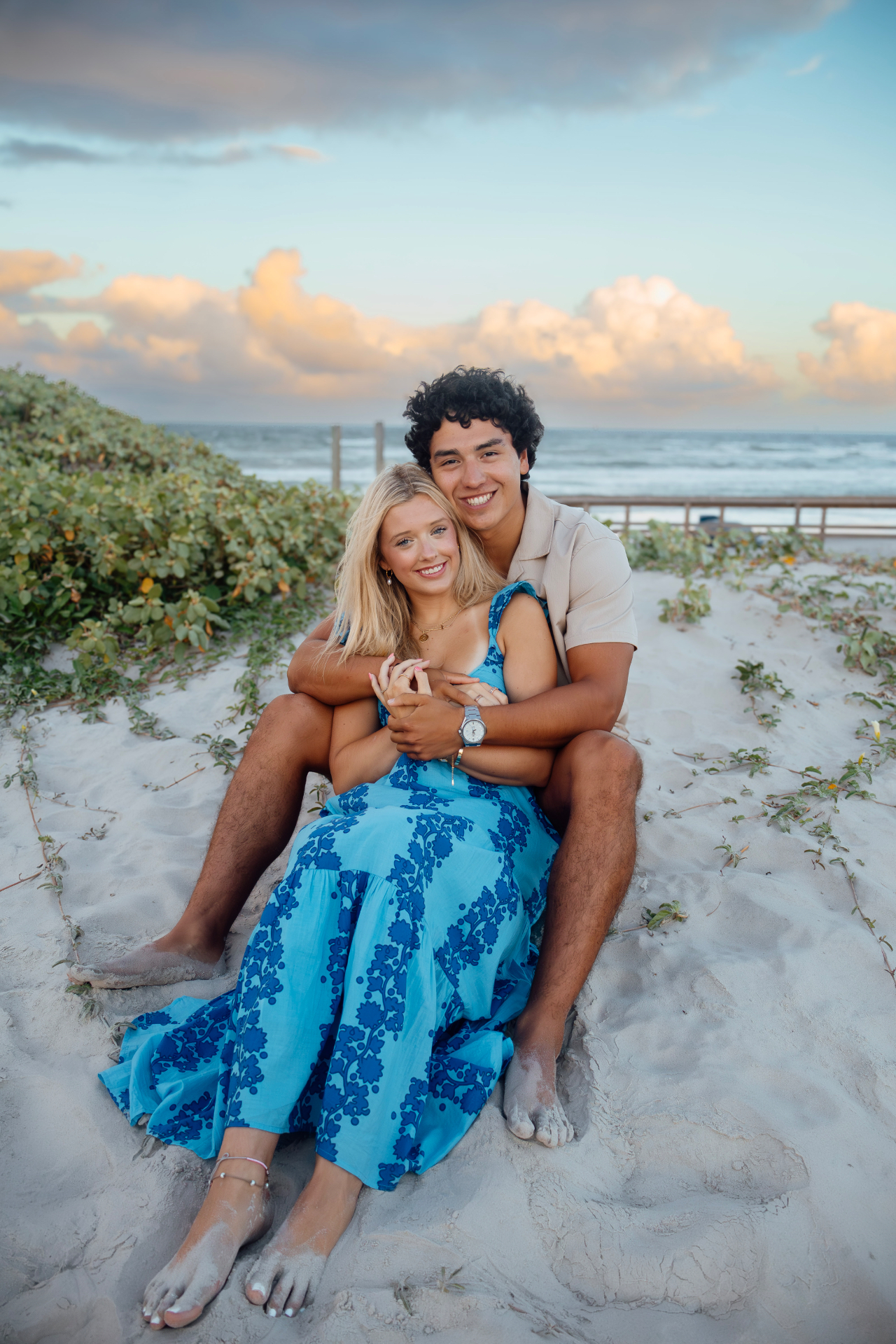 Couple embracing in the surf at sunset on North Padre Island